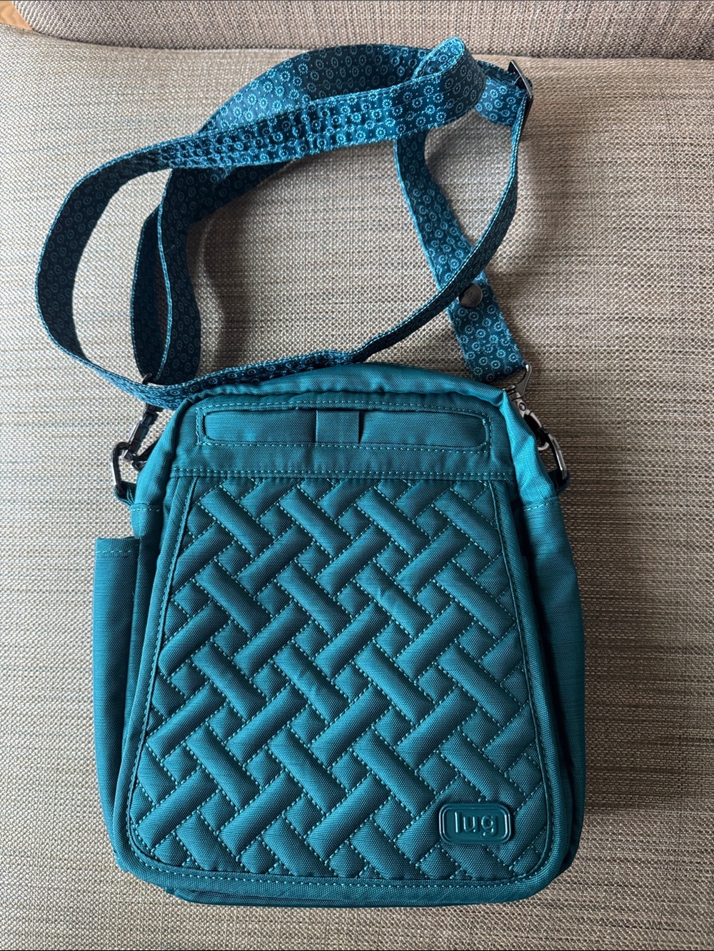 lug flapper Teal Quilted Crossbody Bag with Patterned Strap